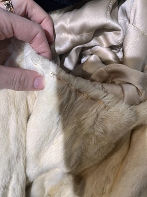 Lot 317 - A Nina Ricci haute couture black damask satin evening coat, 1950s