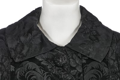 Lot 317 - A Nina Ricci haute couture black damask satin evening coat, 1950s