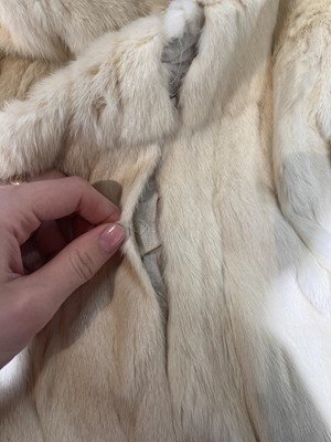 Lot 317 - A Nina Ricci haute couture black damask satin evening coat, 1950s