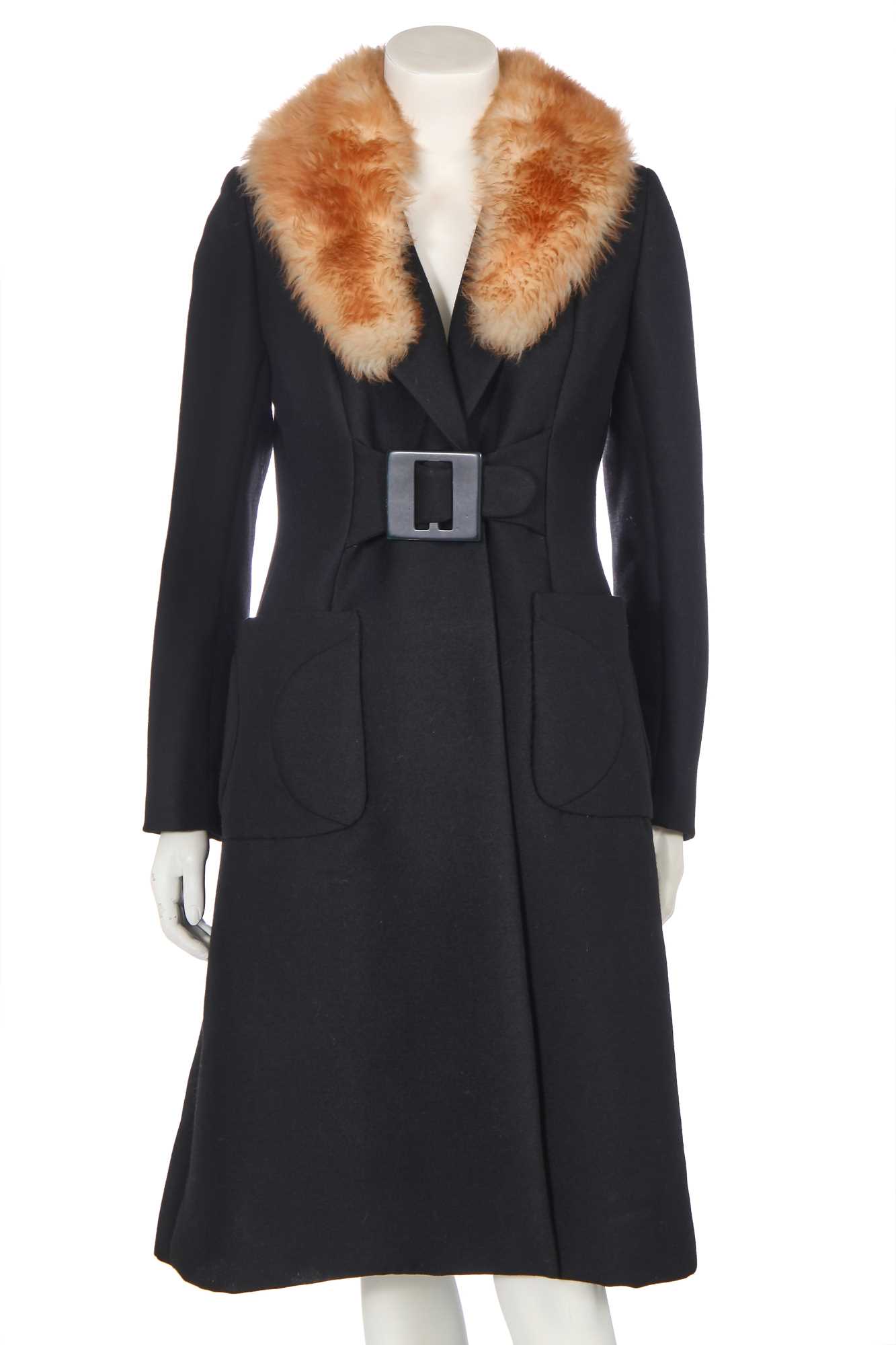 Lot 256 - A Madeleine Vramant  black wool coat, late 1960s