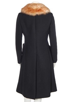 Lot 256 - A Madeleine Vramant  black wool coat, late 1960s