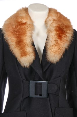 Lot 256 - A Madeleine Vramant  black wool coat, late 1960s