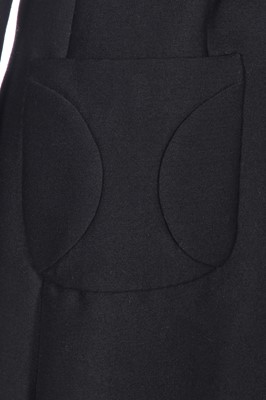 Lot 256 - A Madeleine Vramant  black wool coat, late 1960s