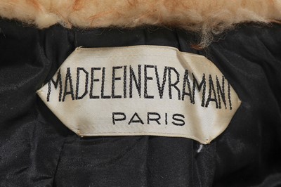 Lot 256 - A Madeleine Vramant  black wool coat, late 1960s