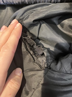 Lot 256 - A Madeleine Vramant  black wool coat, late 1960s