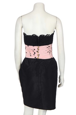 Lot 17 - A Chanel little black dress with polka-dot pink faille cummerbund, Spring-Summer 1988