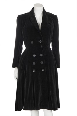 Lot 318 - A Jacques Fath black velvet evening coat, early 1950s