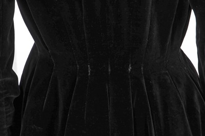 Lot 318 - A Jacques Fath black velvet evening coat, early 1950s