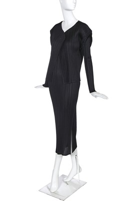 Lot 319 - An Issey Miyake pleated black polyester two-piece ensemble, 2004