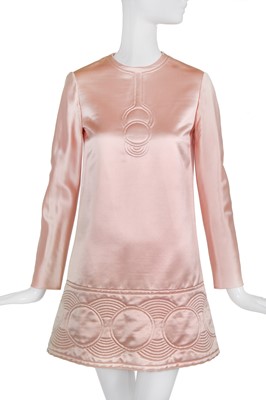 Lot 137 - A Pierre Cardin quilted pink satin mini-dress, 1969