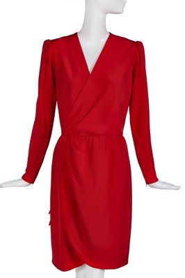 Lot 190 - An Yves Saint Laurent couture red silk wrap-over cocktail dress, probably Autumn-Winter 1983-84