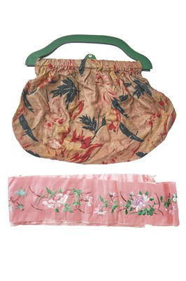 Lot 411 - A leather bound canvas trunk containing lace trimmings, men's shirts and lingerie