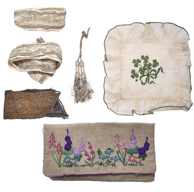 Lot 411 - A leather bound canvas trunk containing lace trimmings, men's shirts and lingerie