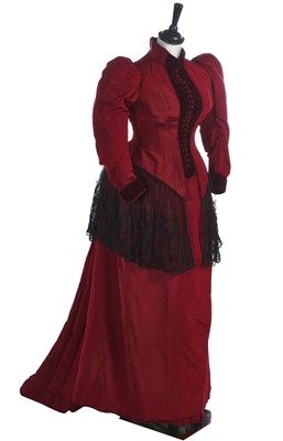 Lot 417 - A burgundy faille day/walking dress, circa 1890 and other items