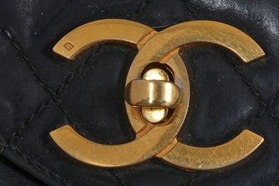 Lot 21 - A Chanel quilted vinyl jumbo bag, 1980s-early 90s