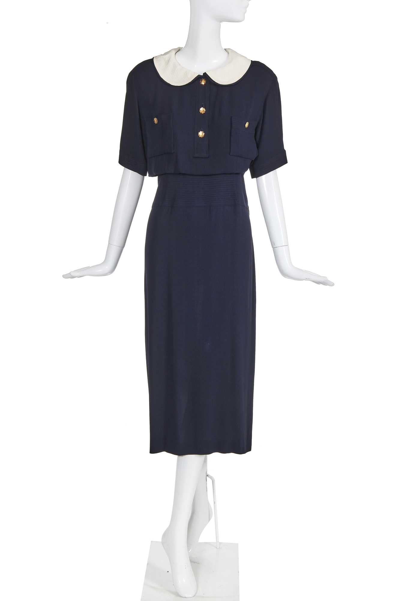 Lot 27 - A Chanel navy silk crêpe dress, circa 1986