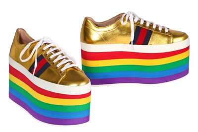 Lot 39 - A pair of Gucci gold leather trainers with rainbow foam platform soles, Resort 2017