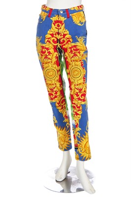 Lot 132 - A pair of Versace printed denim jeans, circa 1993