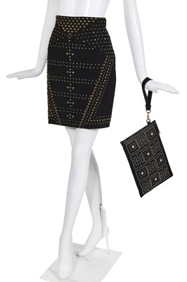 Lot 38 - A Versace studded handbag and skirt, modern