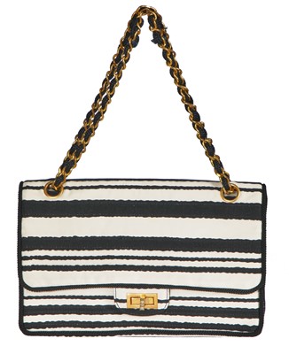 Lot 22 - A Chanel 2.55 bag in black and white striped silk, 1966