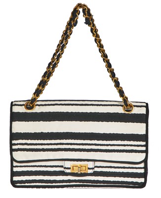 Lot 22 - A Chanel 2.55 bag in black and white striped silk, 1966