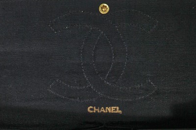 Lot 22 - A Chanel 2.55 bag in black and white striped silk, 1966