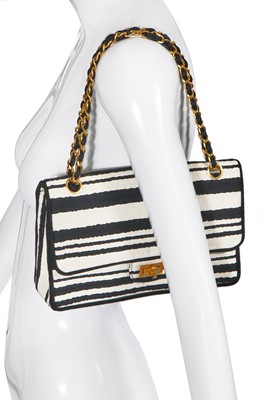 Lot 22 - A Chanel 2.55 bag in black and white striped silk, 1966