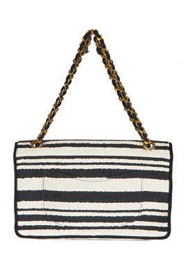 Lot 22 - A Chanel 2.55 bag in black and white striped silk, 1966