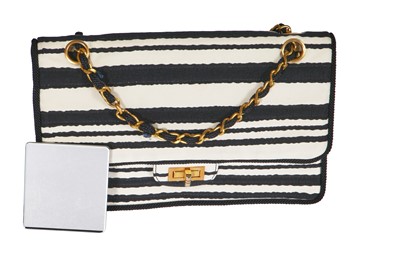 Lot 22 - A Chanel 2.55 bag in black and white striped silk, 1966