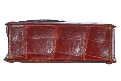 Lot 73 - 'Evita' interest: a brown crocodile handbag, circa 1945 used in the 1996 film