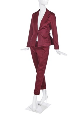 Lot 217 - A Galliano's Girl maroon trouser suit, 1991