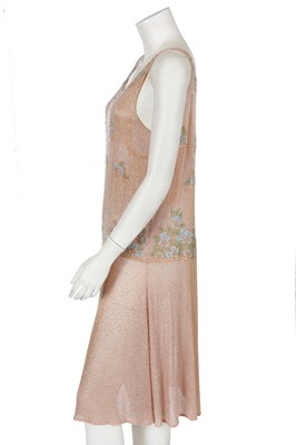 Lot 365 - A beaded peach muslin bridesmaid/flapper dress, circa 1928