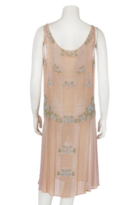 Lot 365 - A beaded peach muslin bridesmaid/flapper dress, circa 1928