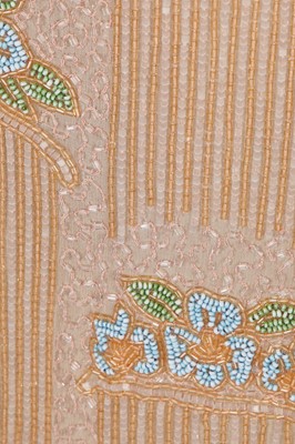 Lot 365 - A beaded peach muslin bridesmaid/flapper dress, circa 1928