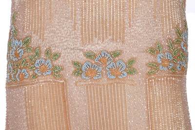 Lot 365 - A beaded peach muslin bridesmaid/flapper dress, circa 1928