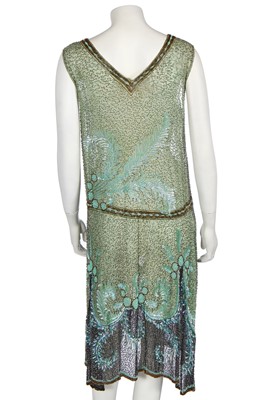 Lot 383 - A fine beaded green muslin flapper dress, circa 1928
