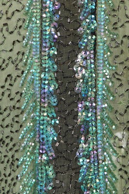 Lot 383 - A fine beaded green muslin flapper dress, circa 1928