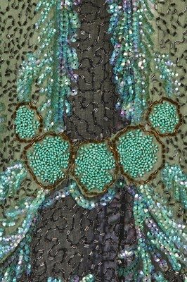 Lot 383 - A fine beaded green muslin flapper dress, circa 1928