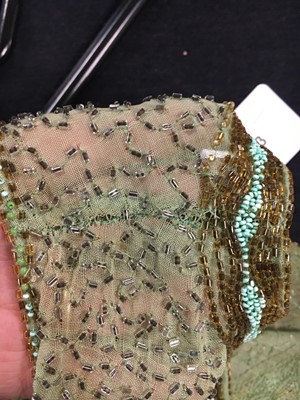 Lot 383 - A fine beaded green muslin flapper dress, circa 1928