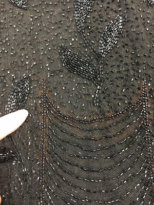 Lot 385 - A beaded tabard and jacket, 1920s