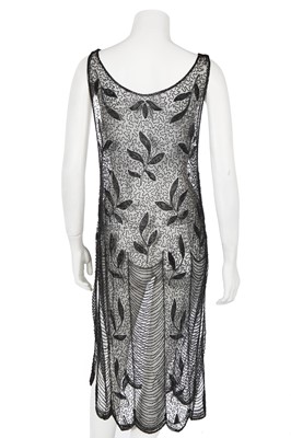 Lot 385 - A beaded tabard and jacket, 1920s