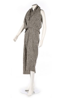 Lot 416 - An Issey Miyake black and white striped tweed...