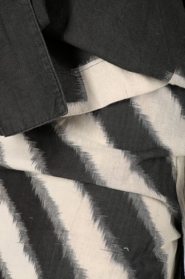 Lot 417 - An Issey Miyake black and white ikat weave...