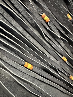 Lot 20 - A man's fringed charcoal grey suede ensemble, 1960s