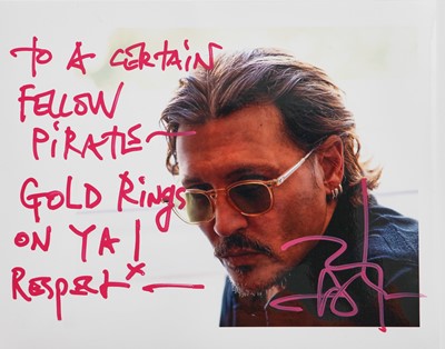 Lot 100 - Johnny Depp autographed photograph