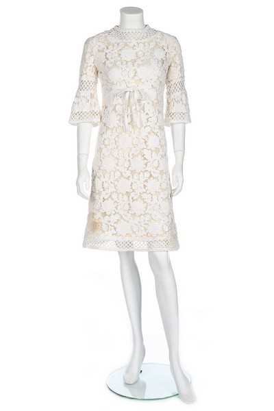 Lot 236 - A Pierre Balmain white soutache lace dress,...