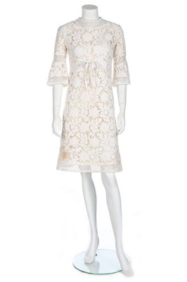 Lot 425 - A Pierre Balmain white soutache lace dress,...