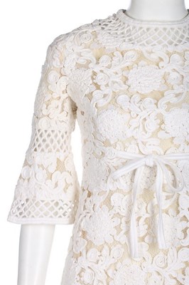 Lot 236 - A Pierre Balmain white soutache lace dress,...