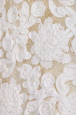 Lot 236 - A Pierre Balmain white soutache lace dress,...