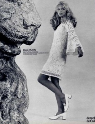 Lot 236 - A Pierre Balmain white soutache lace dress,...